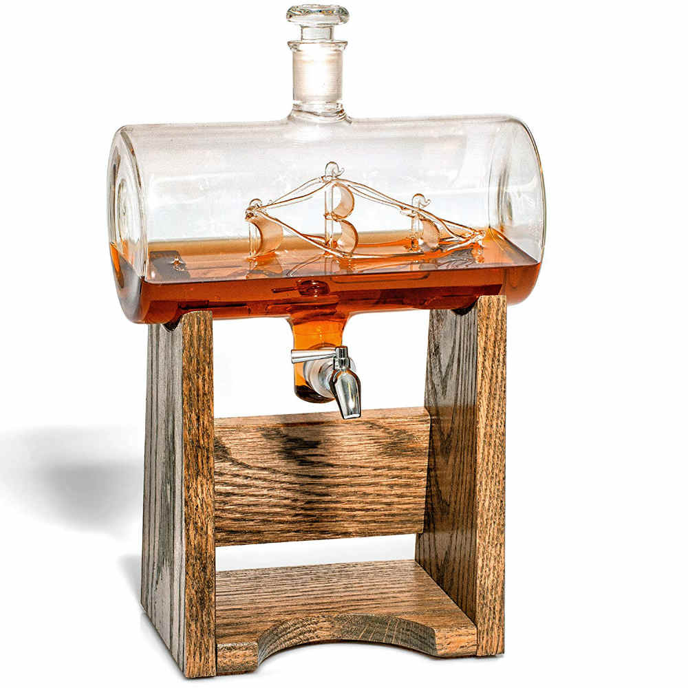 A Stunning Glass Whiskey Decanter With A Wooden Base