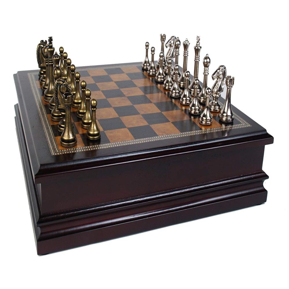 An Elegant Metal Chess Set With A Wooden Board For A True Chess Player